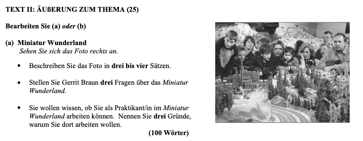 TEXT-II:-ÄUßERUNG-ZUM-THEMA-(25)-Bearbeiten-Sie-(a)-oder-(b)--(a)-Miniatur-Wunderland-Sehen-Sie-sich-das-Foto-rechts-an-Leaving Cert German-Question 25-2011.png